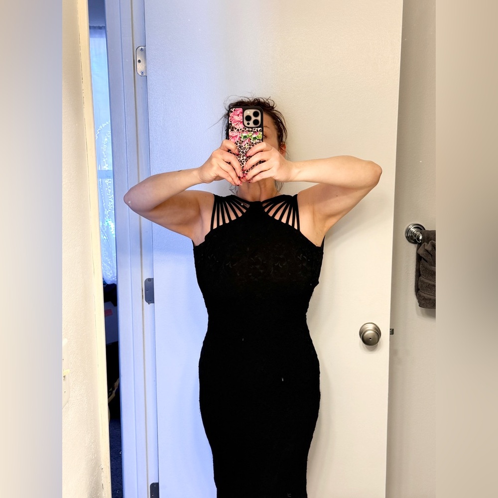 Dress the Population Black Strappy Dress. Size S. Zippers in back. Gives Curves